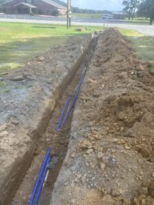 Plumber installing new water lines