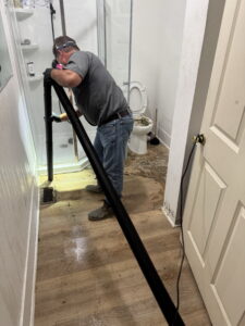 Plumber cleans work area