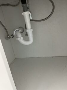 Under sink plumbing work