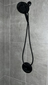 New shower head installation in Arkansas home